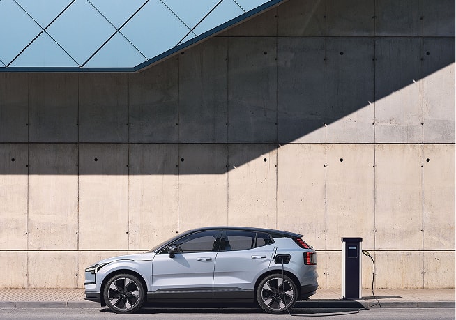 Volvo SUV plugged into a dc charger