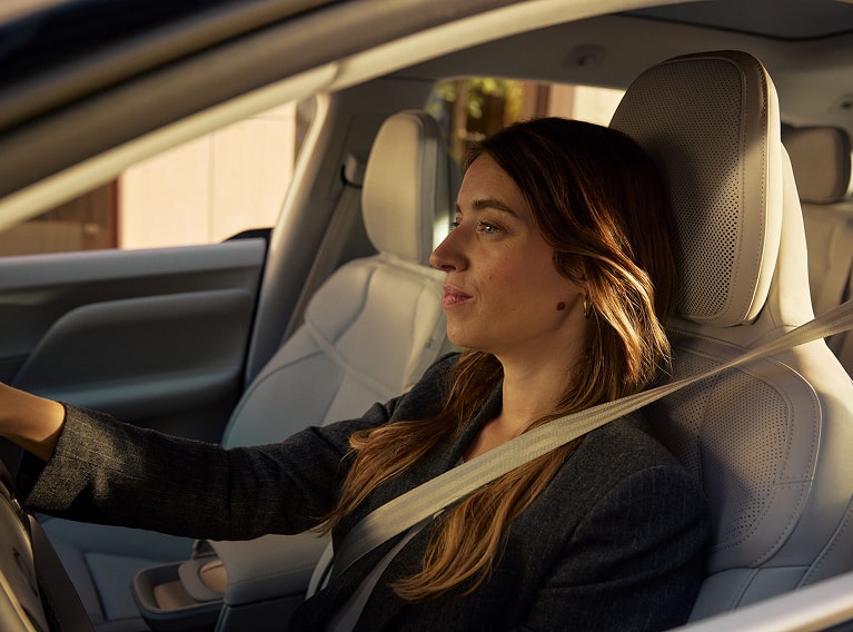 seatbelted driver in a Volvo EX60